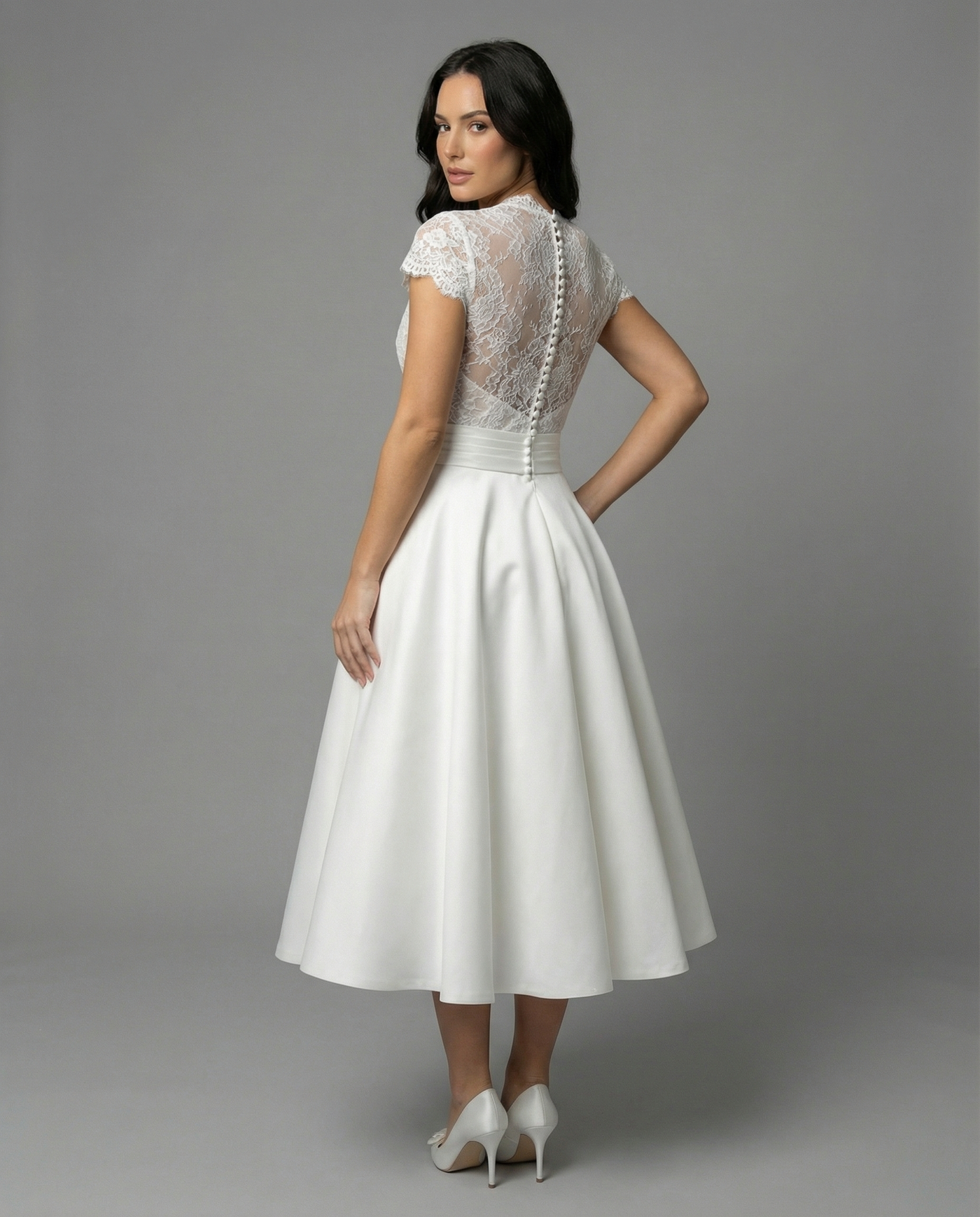 Elegant White Wedding Dress with Lace Bodice and Full Skirt
