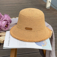 Elegant Woven Bucket Hat with Frayed Brim Detail