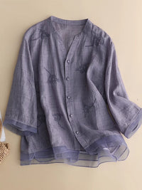 Embroidered Linen Blouse with V-Neckline and Layered Hem
