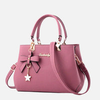 Leather Handbag with Bow and Star Charm Detail