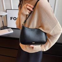 Minimalist Leather Shoulder Bag with Adjustable Strap