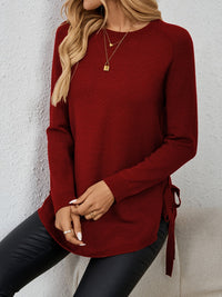 Relaxed Crew Neck Sweater with Side Slits and Bow Detail